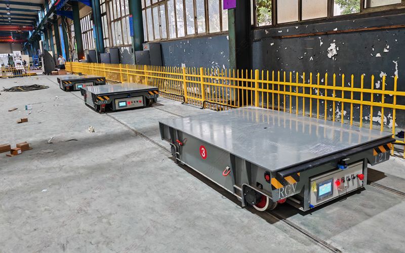 卷?yè)P(yáng)機(jī)牽引式無(wú)動(dòng)力軌道平板車(chē) vs. 電動(dòng)軌道平板車(chē)：特點(diǎn)與特殊工況分析